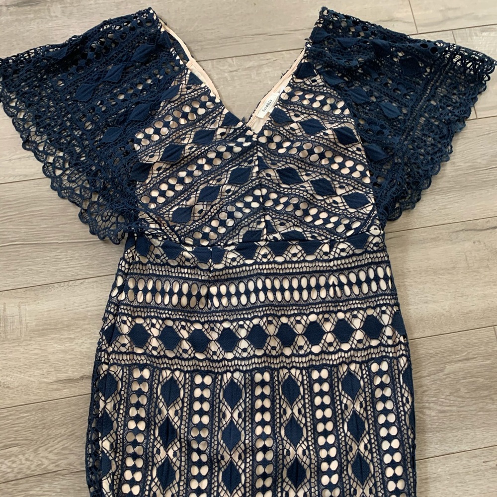 Blue lace and nude dress size (L).